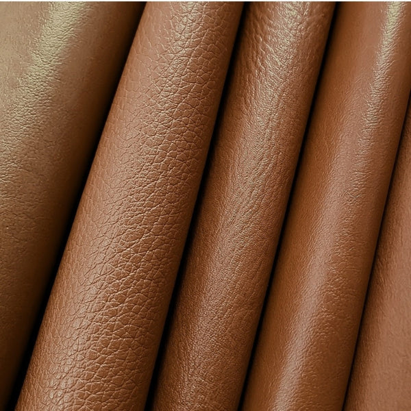 Full grain leather hide surface showing natural grain pattern